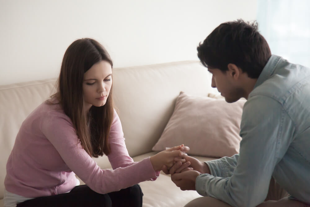 Couple chatting and comforting