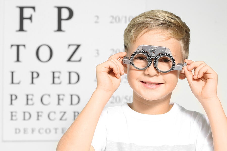 Boy with ophthalmologist glasses